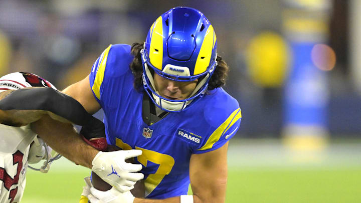 Dec 28, 2024; Inglewood, California, USA;   Los Angeles Rams wide receiver Puka Nacua (17) is stopped by Arizona Cardinals cornerback Sean Murphy-Bunting (23) after a complete pass in the first half at SoFi Stadium. Mandatory Credit: Jayne Kamin-Oncea-Imagn Images