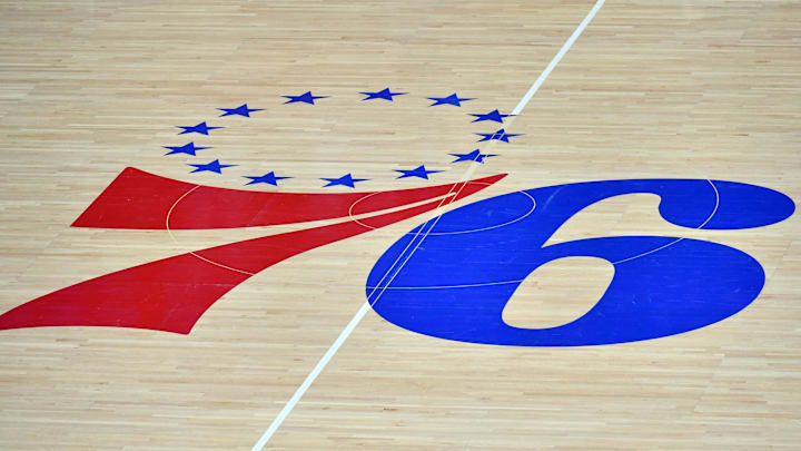 Mar 14, 2021; Philadelphia, Pennsylvania, USA; Philadelphia 76ers logo on the hardwood court against the San Antonio Spurs at Wells Fargo Center. Mandatory Credit: Eric Hartline-Imagn Images