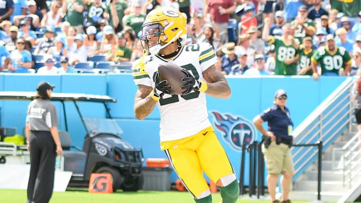 Sep 22, 2024; Nashville, Tennessee, USA;  Green Bay Packers cornerback Jaire Alexander (23) scores on a pick six thrown by Tennessee Titans Will Levis (8) during the first half at Nissan Stadium. Mandatory Credit: Steve Roberts-Imagn Images