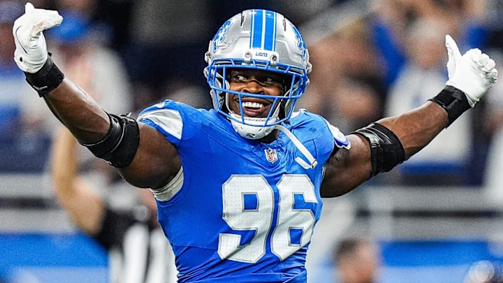 Detroit Lions linebacker Al-Quadin Muhammad (96) celebrates a tackle against the Chicago Bears during the second half at Ford Field in Detroit on Sunday, Sept. 14, 2025.