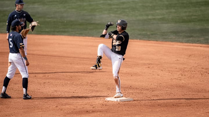 Vanderbilt's Rustan Rigdon celebrates a double to center field in the sixth inning of Sunday's 9-8 win against UC Irvine at the MLB Desert Invitational. Vanderbilt's Rustan Rigdon celebrates a double to center field in the sixth inning of Sunday's 9-8 win against UC Irvine at the MLB Desert Invitational.