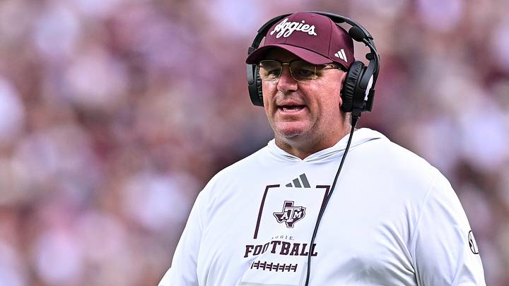 Texas A&M Aggies head coach Mike Elko walks onto the field during a time-out in the first quarter against the Missouri State Bears Texas A&M Aggies head coach Mike Elko walks onto the field during a time-out in the first quarter against the Missouri State Bears