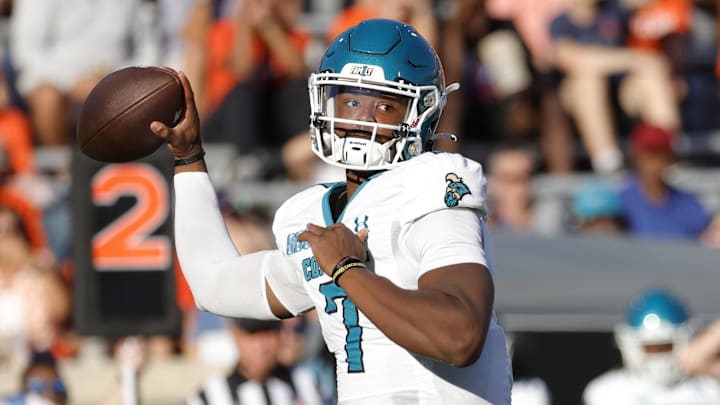 Coastal Carolina Chanticleers quarterback MJ Morris throws the ball against the Virginia Cavaliers during the first quarter at Scott Stadium. Coastal Carolina Chanticleers quarterback MJ Morris throws the ball against the Virginia Cavaliers during the first quarter at Scott Stadium.