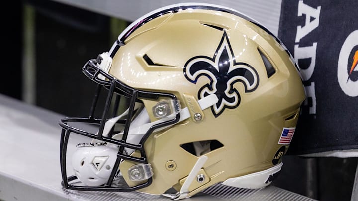 Nov 5, 2023; New Orleans, Louisiana, USA;  Detailed view of the New Orleans Saints helmet on the team bench against the Chicago Bears during the first half at the Caesars Superdome. Mandatory Credit: Stephen Lew-Imagn Images