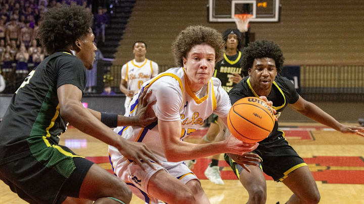 St. Rose’s Jayden Hodge drives to the basket. St. Rose Boys Basketball loses to Roselle Catholic 55-51 in Non-Public B boys basketball state championship in Piscataway on March 14, 2025.
