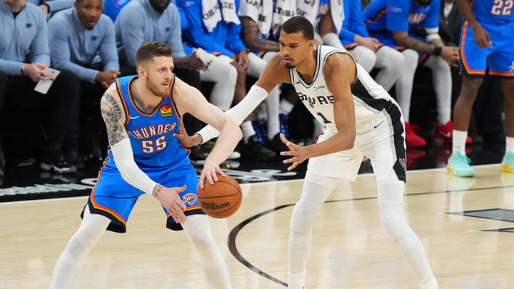 May 24, 2026; San Antonio, Texas, USA; Oklahoma City Thunder center Isaiah Hartenstein (55) passes while defended by San Antonio Spurs center Victor Wembanyama (1) in the third quarter during game four of the western conference finals for the 2026 NBA playoffs at Frost Bank Center. Mandatory Credit: Scott Wachter-Imagn Images May 24, 2026; San Antonio, Texas, USA; Oklahoma City Thunder center Isaiah Hartenstein (55) passes while defended by San Antonio Spurs center Victor Wembanyama (1) in the third quarter during game four of the western conference finals for the 2026 NBA playoffs at Frost Bank Center. Mandatory Credit: Scott Wachter-Imagn Images