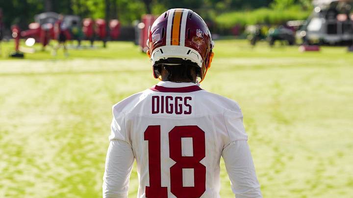 Washington Commanders wide receiver Stefon Diggs takes the field for his first training camp practice with the team Friday in Ashburn, Va. Washington Commanders wide receiver Stefon Diggs takes the field for his first training camp practice with the team Friday in Ashburn, Va.