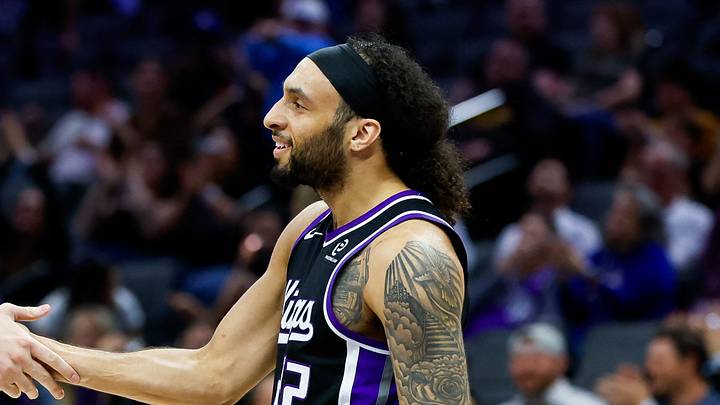 Mar 10, 2026; Sacramento, California, USA; Sacramento Kings center Maxime Raynaud (42) congratulates former teammate Devin Carter (22), now of the Boston Celtics, during the fourth quarter against the Indiana Pacers at Golden 1 Center. Mandatory Credit: Sergio Estrada-Imagn Images