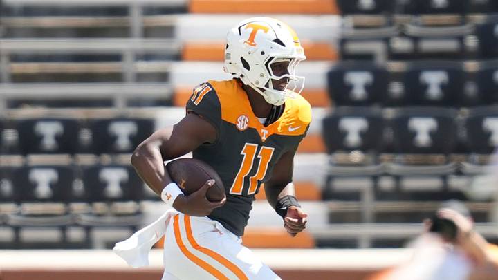 Tennessee quarterback Faizon Brandon (11) runs the ball during the Orange and White game at Neyland Stadium in Knoxville, Tennessee, April 11, 2026. Tennessee quarterback Faizon Brandon (11) runs the ball during the Orange and White game at Neyland Stadium in Knoxville, Tennessee, April 11, 2026.