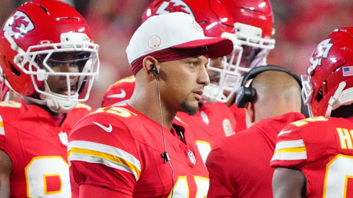 Aug 22, 2025; Kansas City, Missouri, USA; Kansas City Chiefs quarterback Patrick Mahomes (15) on field during a timeout against the Chicago Bears during the game at GEHA Field at Arrowhead Stadium. Mandatory Credit: Denny Medley-Imagn Images