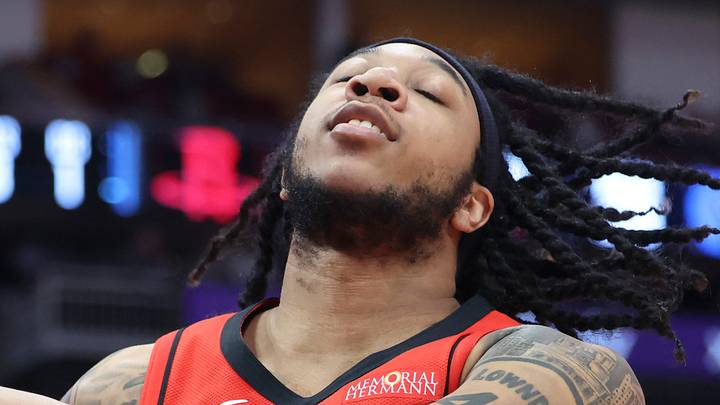 Apr 12, 2026; Houston, Texas, USA; Houston Rockets guard JD Davison (4) reacts after a play during the first quarter against the Memphis Grizzlies at Toyota Center. Mandatory Credit: Troy Taormina-Imagn Images