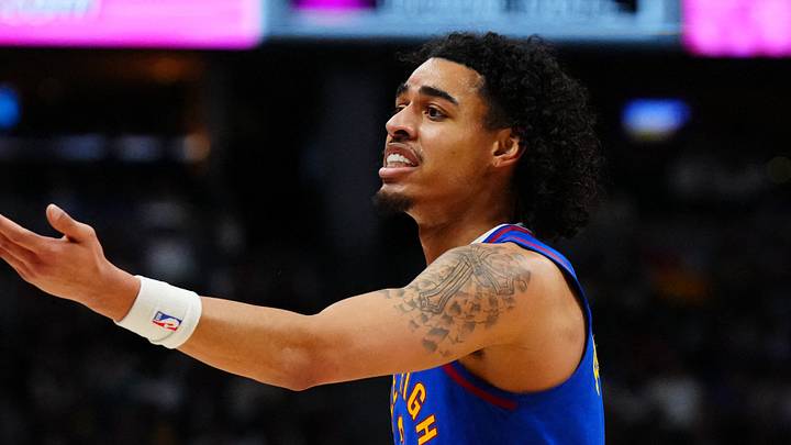 Nov 2, 2024; Denver, Colorado, USA; Denver Nuggets guard Julian Strawther (3) reacts in the first half against the Utah Jazz at Ball Arena. Mandatory Credit: Ron Chenoy-Imagn Images