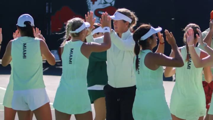 Miami Hurricanes Women's Tennis celebrating a victory Miami Hurricanes Women's Tennis celebrating a victory