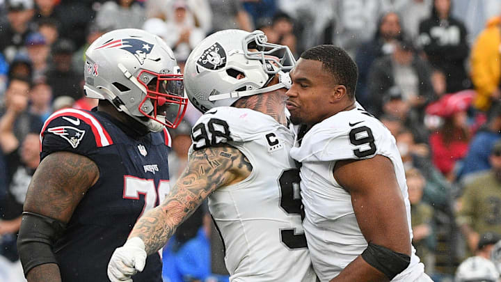 Sep 7, 2025; Foxborough, Massachusetts, USA; Las Vegas Raiders defensive end Tyree Wilson (9) reacts with  defensive end Maxx Crosby (98) during the second half at Gillette Stadium. Mandatory Credit: Bob DeChiara-Imagn Images