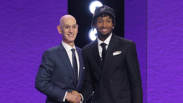 Jun 23, 2026; New York, NY, USA; NBA commissioner Adam Silver greets the second pick in the 2026 NBA draft, Kansas guard Darryn Peterson after he was selected by the Utah Jazz at Barclays Center. Mandatory Credit: Brad Penner-Imagn Images