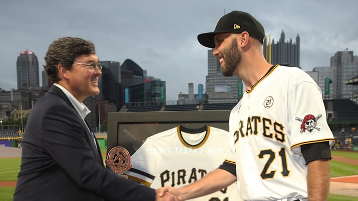 Sep 15, 2021; Pittsburgh, Pennsylvania, USA; Pittsburgh Pirates chairman Robert Nutting (left) presents catcher Jacob Stallings (58) the team Roberto Clemente award before the game against the Cincinnati Reds at PNC Park. Major League Baseball has designated today as Roberto Clemente Day.across the league. Mandatory Credit: Charles LeClaire-Imagn Images Sep 15, 2021; Pittsburgh, Pennsylvania, USA; Pittsburgh Pirates chairman Robert Nutting (left) presents catcher Jacob Stallings (58) the team Roberto Clemente award before the game against the Cincinnati Reds at PNC Park. Major League Baseball has designated today as Roberto Clemente Day.across the league. Mandatory Credit: Charles LeClaire-Imagn Images