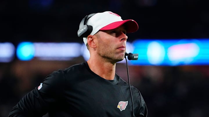 Cardinals head coach Jonathan Gannon looks up at the scoreboard during a preseason game against the Raiders at State Farm Stadium in Glendale on Aug. 23, 2025.