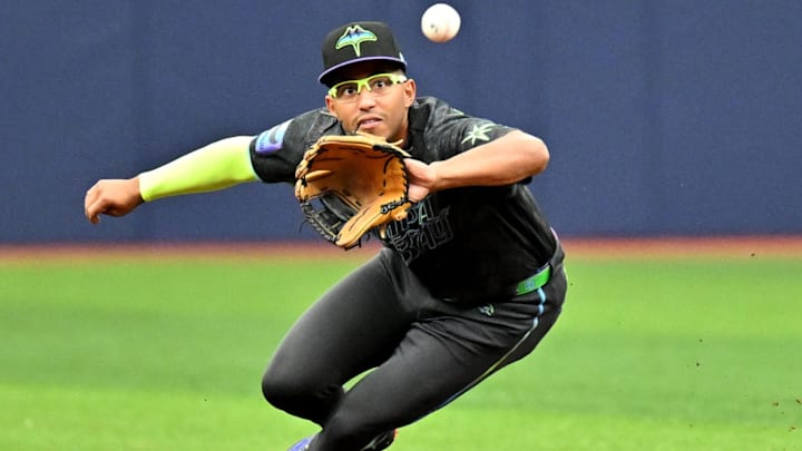 Apr 25, 2026; St. Petersburg, Florida, USA; Tampa Bay Rays second baseman Richie Palacios (1) fields a line drive in the second inning against the Minnesota Twins at Tropicana Field.