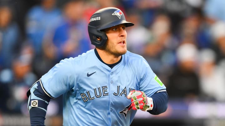 Oct 15, 2025; Seattle, Washington, USA; Toronto Blue Jays center fielder Daulton Varsho (5) runs after hitting a two RBI double during the third inning against the Seattle Mariners during game three of the ALCS round for the 2025 MLB playoffs at T-Mobile Park. Mandatory Credit: Steven Bisig-Imagn Images Oct 15, 2025; Seattle, Washington, USA; Toronto Blue Jays center fielder Daulton Varsho (5) runs after hitting a two RBI double during the third inning against the Seattle Mariners during game three of the ALCS round for the 2025 MLB playoffs at T-Mobile Park. Mandatory Credit: Steven Bisig-Imagn Images