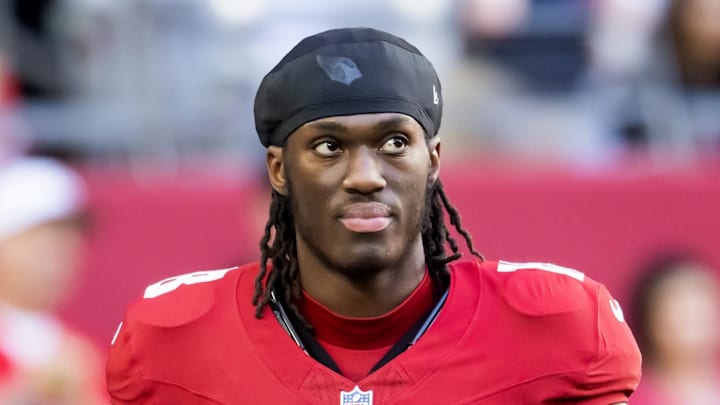 Jan 5, 2025; Glendale, Arizona, USA; Arizona Cardinals wide receiver Marvin Harrison Jr. (18) against the San Francisco 49ers at State Farm Stadium. Mandatory Credit: Mark J. Rebilas-Imagn Images