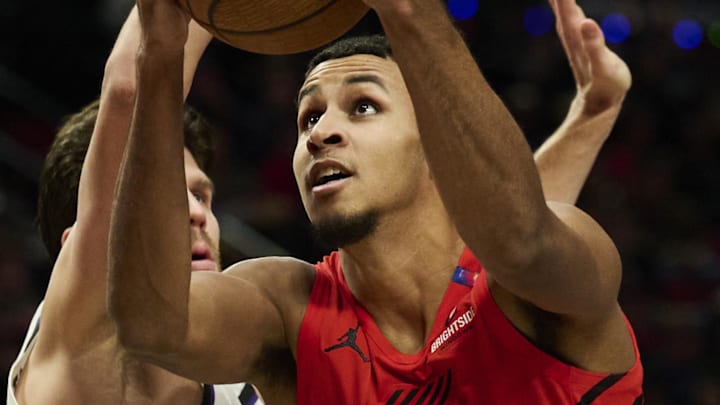 Nov 29, 2024; Portland, Oregon, USA; Portland Trail Blazers forward Kris Murray (24) drives to the basket during the second half against Sacramento Kings forward Doug McDermott (7) at Moda Center. Mandatory Credit: Troy Wayrynen-Imagn Images Nov 29, 2024; Portland, Oregon, USA; Portland Trail Blazers forward Kris Murray (24) drives to the basket during the second half against Sacramento Kings forward Doug McDermott (7) at Moda Center. Mandatory Credit: Troy Wayrynen-Imagn Images
