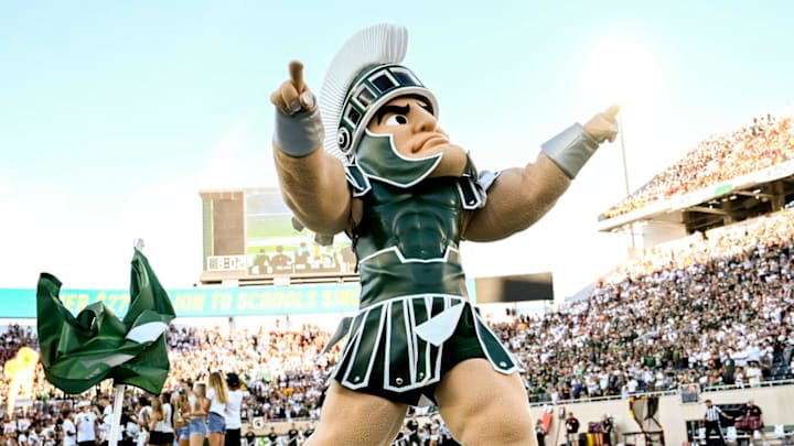 Michigan State mascot Sparty cheers before the football game against Central Michigan on Friday, Sept. 1, 2023, at Spartan Stadium in East Lansing. Michigan State mascot Sparty cheers before the football game against Central Michigan on Friday, Sept. 1, 2023, at Spartan Stadium in East Lansing.