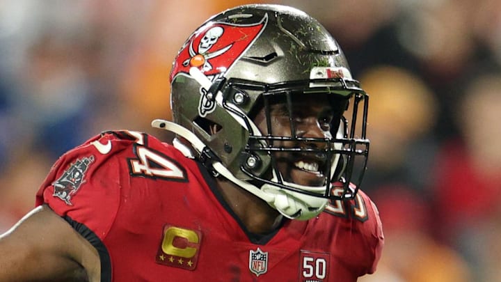 Jan 3, 2026; Tampa, Florida, USA; Tampa Bay Buccaneers linebacker Lavonte David (54) recovers a fumble by the Carolina Panthers in the second half at Raymond James Stadium. Mandatory Credit: Nathan Ray Seebeck-Imagn Images