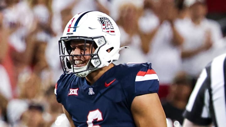 Oct 5, 2024; Tucson, Arizona, USA; Arizona Wildcats defensive lineman Chase Kennedy (11) celebrates tackle against Texas Tech Red Raiders during first quarter at Arizona Stadium. Mandatory Credit: Aryanna Frank-Imagn Images