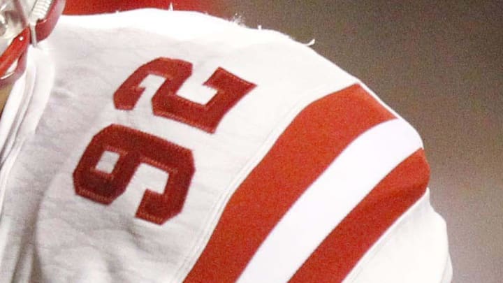 Nebraska football player wearing number 92