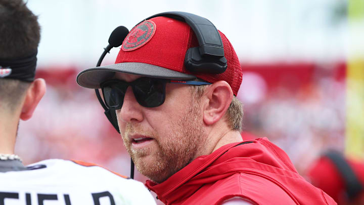 Sep 8, 2024; Tampa, Florida, USA;  Tampa Bay Buccaneers quarterback Baker Mayfield (6) talks with offensive coordinator Liam Coen against the Washington Commanders during the first half at Raymond James Stadium. Mandatory Credit: Kim Klement Neitzel-Imagn Images