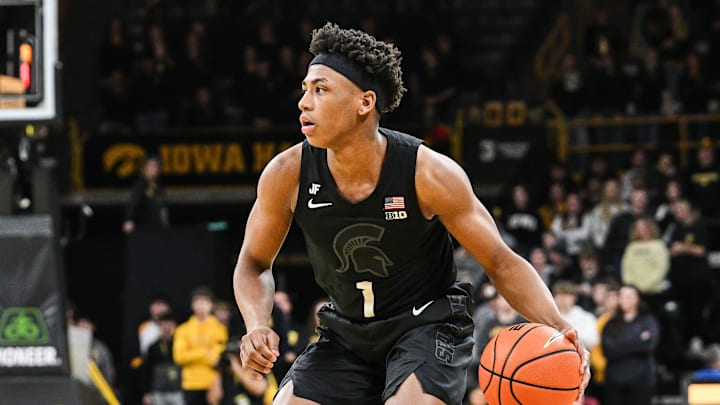 Mar 6, 2025; Iowa City, Iowa, USA; Michigan State Spartans guard Jeremy Fears Jr. (1) controls the ball as Iowa Hawkeyes guard Drew Thelwell (3) defends during the first half at Carver-Hawkeye Arena. Mandatory Credit: Jeffrey Becker-Imagn Images
