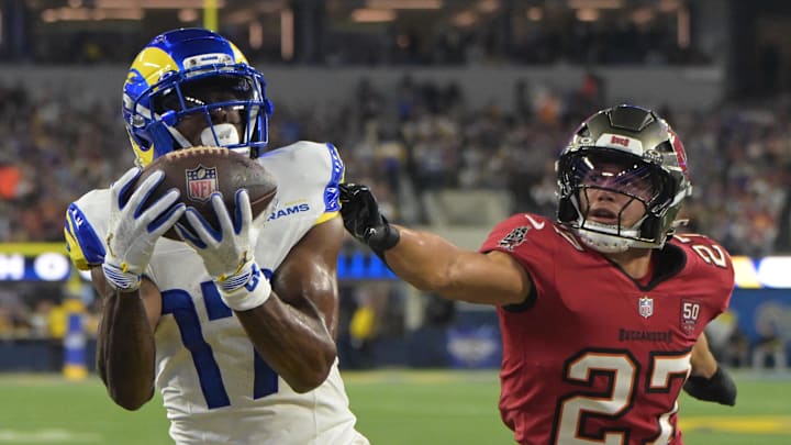 Los Angeles Rams wide receiver Davante Adams (17) catches a one-yard touchdown pass thrown by quarterback Matthew Stafford against Tampa Bay Buccaneers cornerback Zyon McCollum