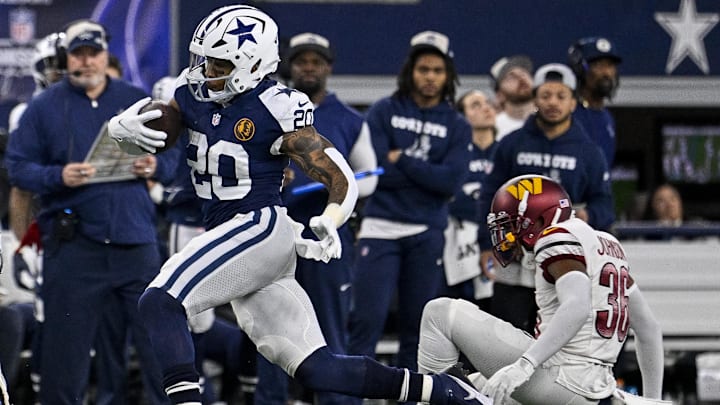 Nov 23, 2023; Arlington, Texas, USA; Dallas Cowboys running back Tony Pollard (20) runs past