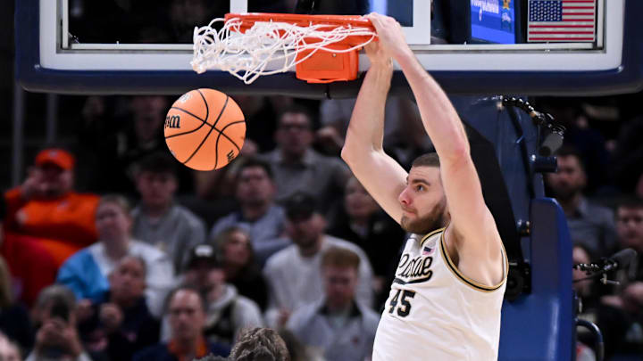 Purdue Boilermakers center Oscar Cluff (45) dunks the ball 