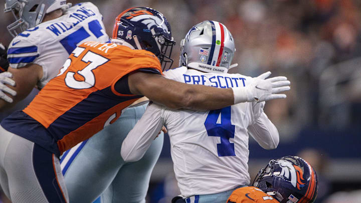 Dallas Cowboys quarterback Dak Prescott is hit by Denver Broncos linebacker Jonathon Cooper at AT&T Stadium Dallas Cowboys quarterback Dak Prescott is hit by Denver Broncos linebacker Jonathon Cooper at AT&T Stadium