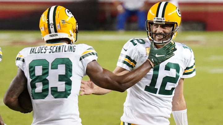 Nov 5, 2020; Santa Clara, California, USA; Former Green Bay Packers wide receiver Marquez Valdes-Scantling (83) celebrates with quarterback Aaron Rodgers (12) after catching a pass to score a touchdown against the San Francisco 49ers during the second quarter at Levi's Stadium.