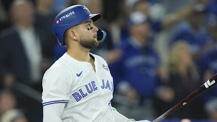 Nov 1, 2025; Toronto, Ontario, CAN; Toronto Blue Jays designated hitter Bo Bichette (11) hits a three run home run against the Los Angeles Dodgers in the third inning during game seven of the 2025 MLB World Series at Rogers Centre. Mandatory Credit: John E. Sokolowski-Imagn Images