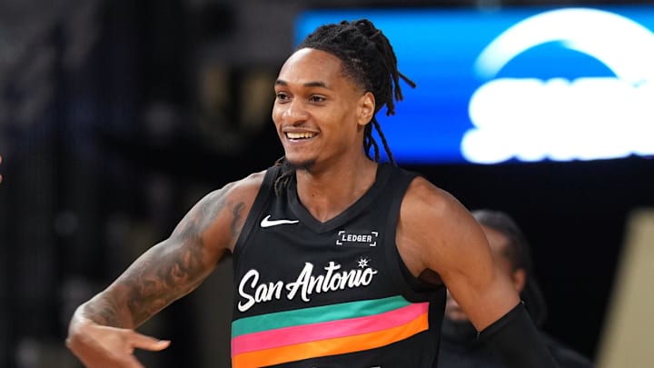 Mar 6, 2026; San Antonio, Texas, USA; San Antonio Spurs guard Devin Vassell (24) and forward Keldon Johnson (3) react during the second half against the Los Angeles Clippers at Frost Bank Center. Mandatory Credit: Scott Wachter-Imagn Images