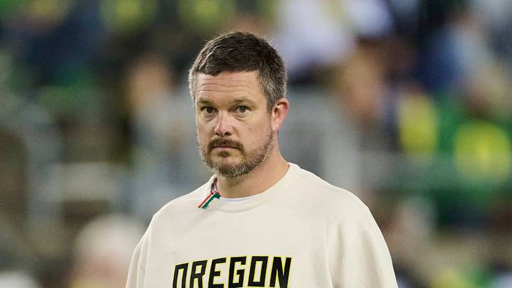 Oct 17, 2026; Eugene, Oregon, USA; Oregon Ducks head coach Dan Lanning watches his team warm up before a game against the Nebraska Cornhuskers at Autzen Stadium. Mandatory Credit: Troy Wayrynen-Imagn Images Oct 17, 2026; Eugene, Oregon, USA; Oregon Ducks head coach Dan Lanning watches his team warm up before a game against the Nebraska Cornhuskers at Autzen Stadium. Mandatory Credit: Troy Wayrynen-Imagn Images