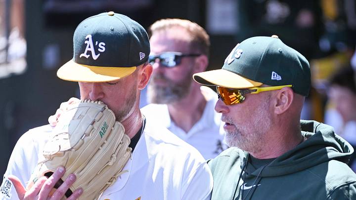 Apr 30, 2026; West Sacramento, California, USA; Athletics pitcher Jeffrey Springs (59) speaks with manager Mark Kotsay (7) after the third inning at Sutter Health Park. Mandatory Credit: Ed Szczepanski-Imagn Images