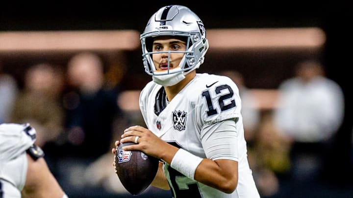 Dec 29, 2024; New Orleans, Louisiana, USA; Las Vegas Raiders quarterback Aidan O'Connell (12) looks on against the New Orleans Saints during the second half at Caesars Superdome. Mandatory Credit: Stephen Lew-Imagn Images Dec 29, 2024; New Orleans, Louisiana, USA; Las Vegas Raiders quarterback Aidan O'Connell (12) looks on against the New Orleans Saints during the second half at Caesars Superdome. Mandatory Credit: Stephen Lew-Imagn Images
