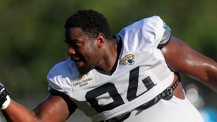 Jacksonville Jaguars defensive tackle Folorunso Fatukasi (94) greets defensive end Dawuane Smoot (91) Dawuane Smoot during training camp Monday, Aug. 7, 2023 at Miller Electric Center at EverBank Stadium in Jacksonville, Fla. This was the 11th day of training camp.