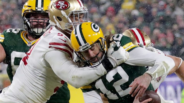 49ers defensive end Arik Armstead (91) sacks Green Bay Packers quarterback Aaron Rodgers during their playoff game.