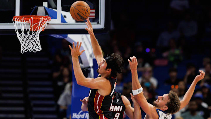 Oct 12, 2025; Orlando, Florida, USA; Miami Heat guard Jaime Jaquez Jr. (11) makes a layup over Orlando Magic forward Franz Wagner (22) during the first half at Kia Center. Mandatory Credit: Matt Pendleton-Imagn Images Oct 12, 2025; Orlando, Florida, USA; Miami Heat guard Jaime Jaquez Jr. (11) makes a layup over Orlando Magic forward Franz Wagner (22) during the first half at Kia Center. Mandatory Credit: Matt Pendleton-Imagn Images