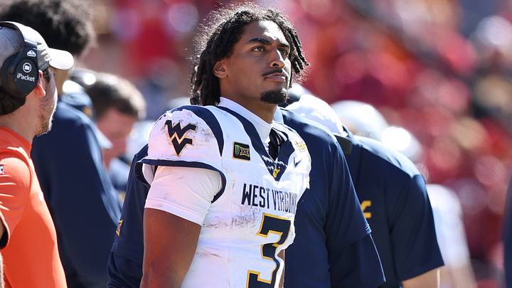 Oct 3, 2026; Ames, Iowa, USA; West Virginia Mountaineers quarterback Michael Hawkins Jr. (3) watches his team play the Iowa State Cyclones during the second half at Jack Trice Stadium. Mandatory Credit: Reese Strickland-Imagn Images Oct 3, 2026; Ames, Iowa, USA; West Virginia Mountaineers quarterback Michael Hawkins Jr. (3) watches his team play the Iowa State Cyclones during the second half at Jack Trice Stadium. Mandatory Credit: Reese Strickland-Imagn Images