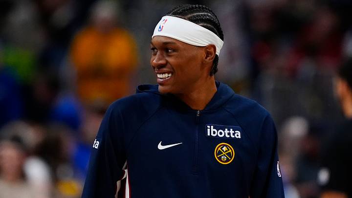 Mar 22, 2026; Denver, Colorado, USA; Denver Nuggets guard Peyton Watson (8) smiles before the game against the Portland Trail Blazers at Ball Arena. Mandatory Credit: Ron Chenoy-Imagn Images