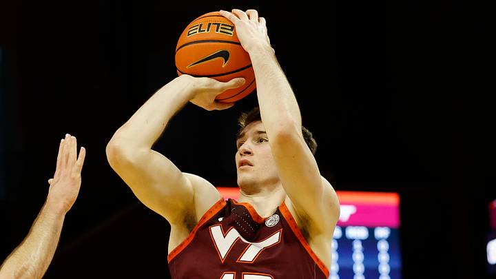Mar 7, 2026; Charlottesville, Virginia, USA; Virginia Tech Hokies guard Neoklis Avdalas (17) shoots the ball as Virginia Cavaliers guard Dallin Hall (30) defends in the first half at John Paul Jones Arena. Mandatory Credit: Geoff Burke-Imagn Images Mar 7, 2026; Charlottesville, Virginia, USA; Virginia Tech Hokies guard Neoklis Avdalas (17) shoots the ball as Virginia Cavaliers guard Dallin Hall (30) defends in the first half at John Paul Jones Arena. Mandatory Credit: Geoff Burke-Imagn Images