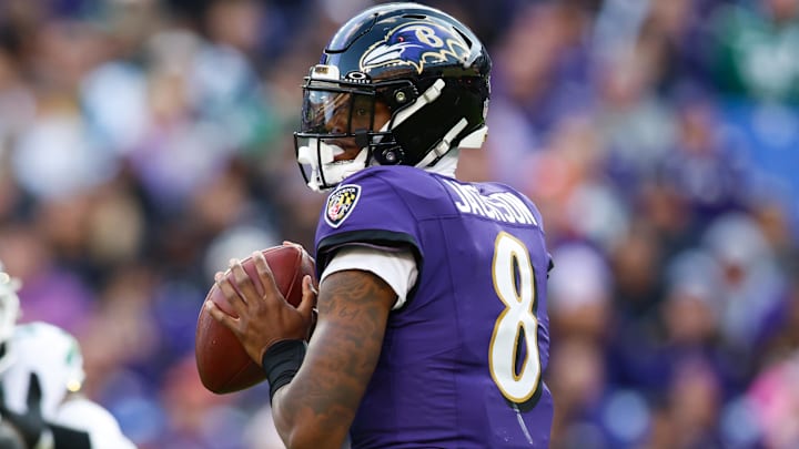 Nov 23, 2025; Baltimore, Maryland, USA;  Baltimore Ravens quarterback Lamar Jackson (8) looks to pass during the fourth quarter against the New York Jets at M&T Bank Stadium. Mandatory Credit: Peter Casey-Imagn Images