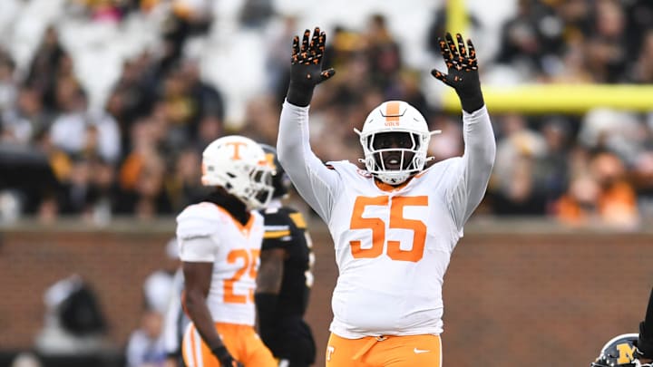 Tennessee defensive lineman Omarr Norman-Lott (55) celebrating after tackling Missouri quarterback Brady Cook (12) during an NCAA college football game on Saturday, November 11, 2023 in Columbia, MO. Tennessee defensive lineman Omarr Norman-Lott (55) celebrating after tackling Missouri quarterback Brady Cook (12) during an NCAA college football game on Saturday, November 11, 2023 in Columbia, MO.