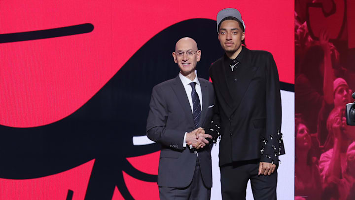 Jun 25, 2025; Brooklyn, NY, USA;  Noa Essengue stands with NBA commissioner Adam Silver after being selected as the 12th pick by the Chicago Bulls in the first round of the 2025 NBA Draft at Barclays Center. Mandatory Credit: Brad Penner-Imagn Images